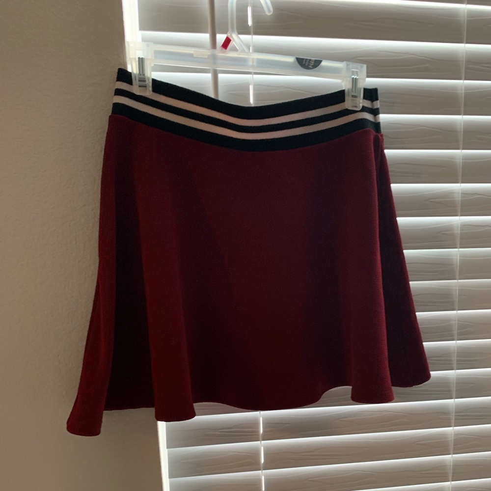 Burgundy mini skirt with black and white stripes